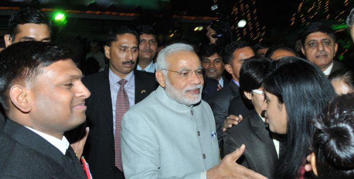 India Prime Minister Narendra Modi meeting the invitees during the 'At Home' function, organised on the occasion of Navy Day in New Delhi