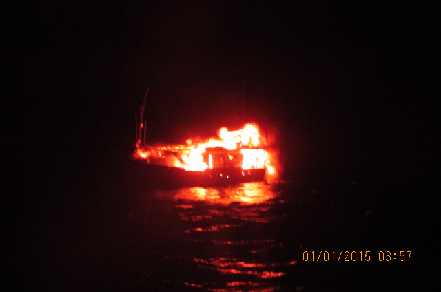 A view of the suspicious craft under fire on the high sea.