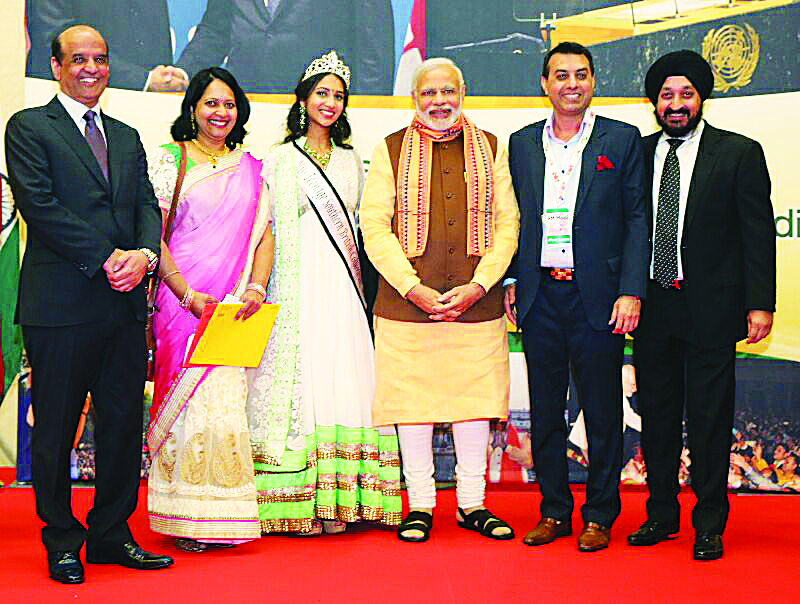 Indian Prime Minister Narendra Modi with OFBJP - BC President Aditya Tawatia, Daljit Thind, Paul Arora, and Aashritha Royyuru, past title holder for Miss Teenage Southern British Columbia with her mother. Photos: Submitted