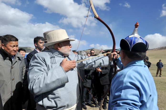 Narendra Modi trying his hand on archery at Mini Naadam Festival, in Ulaanbaatar, Mongolia on May 17, 2015.