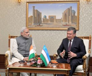 Indian Prime Minister Narendra Modi meeting the Prime Minister of Uzbekistan Shavkat Miromonovich Mirziyoyev at the Meeting Hall of Tashkent Airport, in Tashkent, Uzbekistan on July 06, 2015.