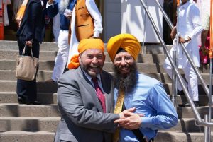 Martin Singh with his party leader Tom Mulcair