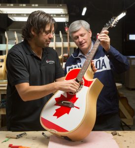 Prime Minister Stephen Harper tours Riversong Guitars in Kamloops, British Columbia, with owner Mike Miltimore, September 14, 2015. CPC Photo by Jason Ransom