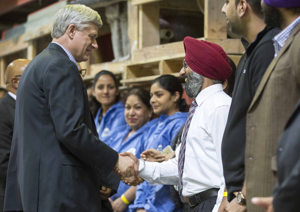 Stephen Harper meets with workers at Fibretech Distributors Inc. in Surrey, October 8, 2015. CPC Photo by Jill Thompson