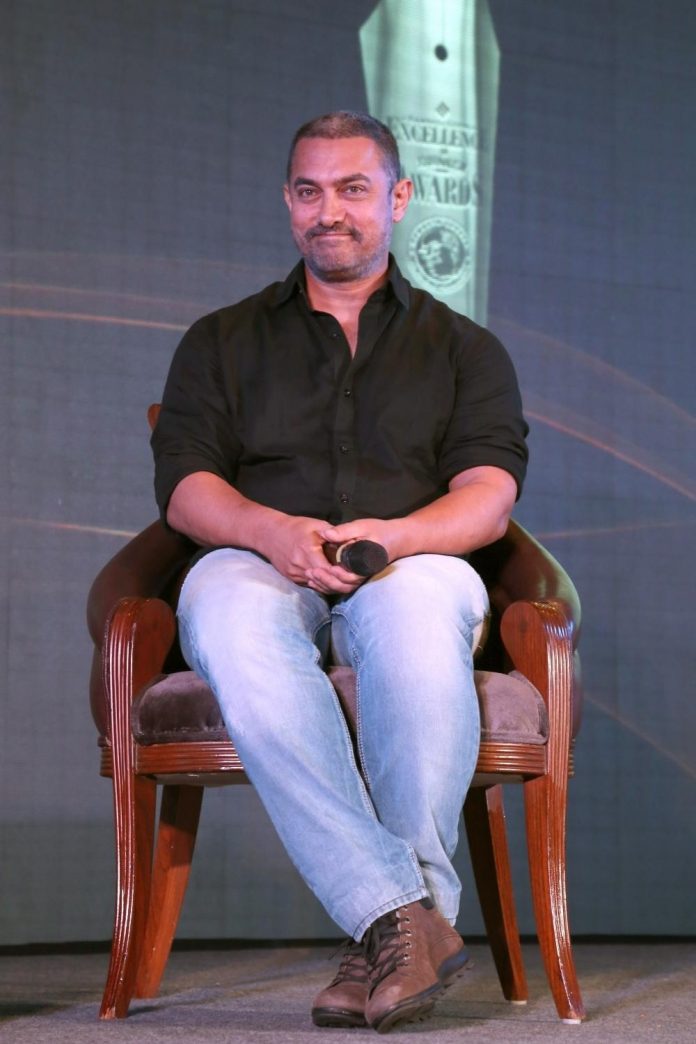 Aamir Khan addresses at the Ramnath Goenka Excellence awards ceremony in New Delhi on Nov 23,2015.(Photo: Amlan Paliwal/IANS)