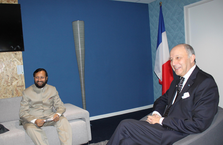 Union Environment Minister Prakash Javadekar French foreign Minister Laurent Fabius at the CoP21 French Presidency office in Paris, France. (Photo: IANS)