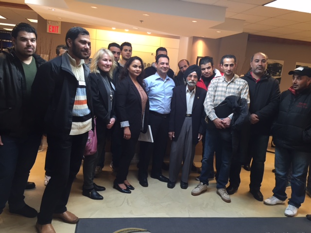 Harjinder Bhogal, Paul Bhogal, Sohan Singh Bhogal with Judi Huta (Community & Employer Services Coordinator) and Syrian Refugees