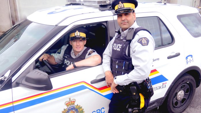 Cst. Jacob (in car) & Cst Sidhu