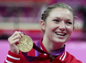 Rosannagh MacLennan of Toronto shows off her gold medal in the women's trampoline at the 2012 London Olympics, Friday, Aug. 3, 2012. THE CANADIAN PRESS/HO, COC - Mike Ridewood