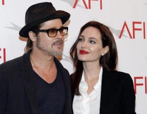 Actor Brad Pitt and Angelina Jolie met on the set of "Mr. and Mrs. Smith" in 2004, when Pitt was still married to Jennifer Aniston. After divorcing from Aniston in 2005, Pitt now has six children with Jolie, and they married in 2014. REUTERS/Kevork Djansezian