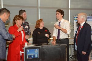 Hybrid Atmospheric Water Generator, which will pull potable water from the atmosphere anywhere there is air. Here, demod Prof. Majid Bahrami, Premier Christy Clark, PhD student Farshid Bagheri co-developer, Mayor Linda Hepner, Prime Minister Justin Trudeau and SFU President Andrew Petter. Photos: Ray Hudson