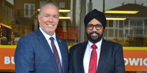 John Horgan with Aman Singh