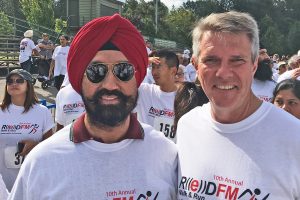 “Satbir Cheema with JohnAldag at the Red FM run.