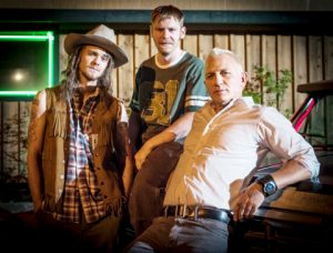 (From L to R): Jack Quaid, Brian Gleeson and Daniel Craig in Lucky Logan, an Entertainment One Release.