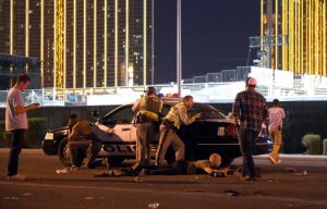 LAS VEGAS, NV - OCTOBER 01: Las Vegas police stand guard along the streets outside the the Route 91 Harvest country music festival grounds after a active shooter was reported on October 1, 2017 in Las Vegas, Nevada. There are reports of an active shooter around the Mandalay Bay Resort and Casino. (Photo by David Becker/Getty Images) ORG XMIT: 775052817