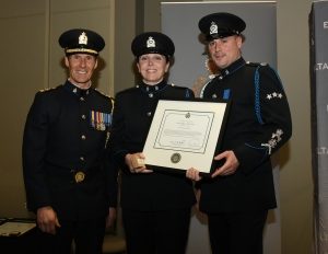 Cst. Kathy Bauman, Patrol Officer of the Year, with Chief Constable Neil Dubord and Delta Police Association Vice President Sgt. Brian Hill
